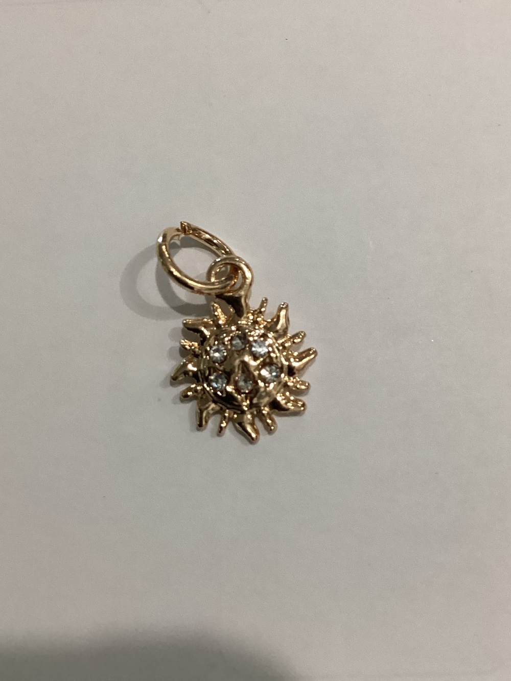 Gold Sunburst Charm Pendant with Clear Crystals